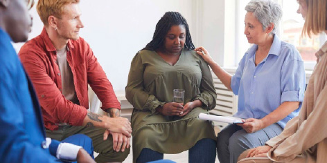 people in a group therapy session